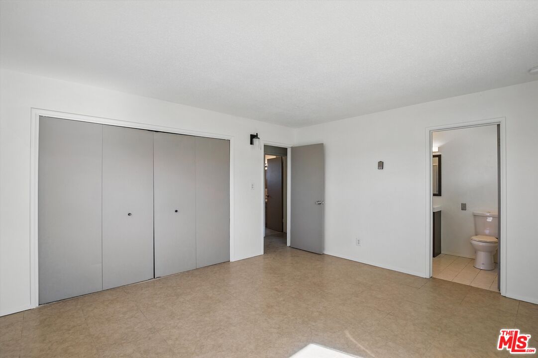 6391 Ruth Drive Yucca Valley, CA 92284 - Photo 26 of 56 a view of room with windows and bathroom view