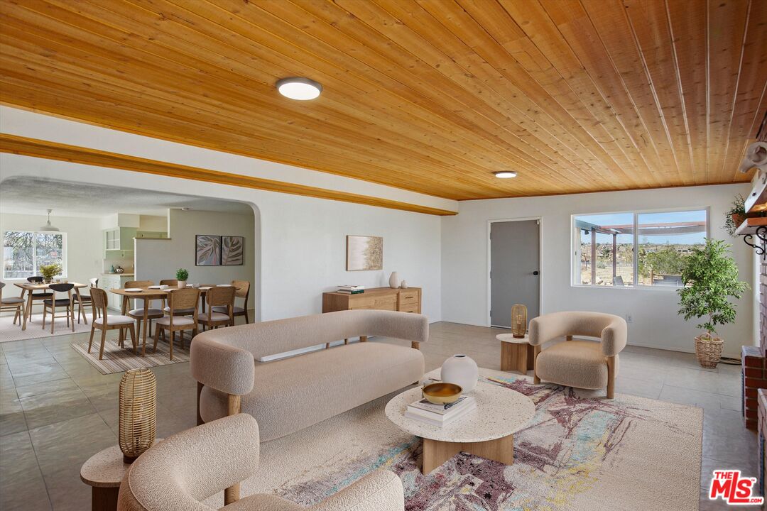 6391 Ruth Drive Yucca Valley, CA 92284 - Photo 3 of 56 a living room with furniture and wooden floor