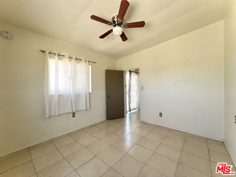 6391 Ruth Drive Yucca Valley, CA 92284 - Photo 48 of 56 a view of an empty room with a window