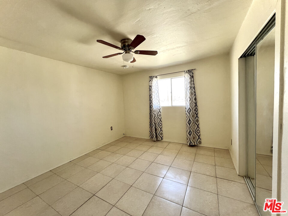 6391 Ruth Drive Yucca Valley, CA 92284 - Photo 51 of 56 a view of an empty room and window