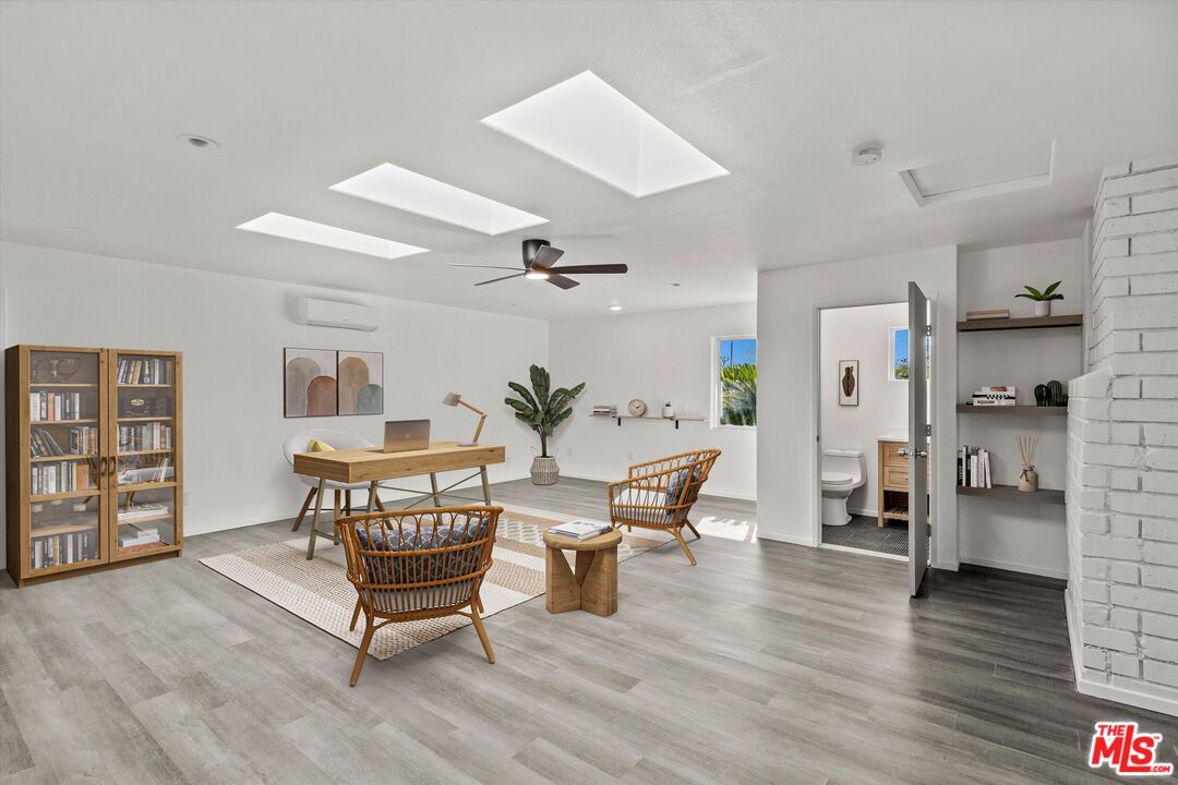 6391 Ruth Drive Yucca Valley, CA 92284 - Photo 7 of 56 a living room with furniture and a wooden floor