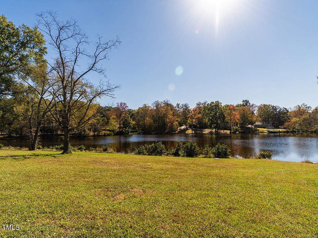 0 Bob Vaughn Road Graham, NC 27253 - Photo 3 of 31 a view of a lake with houses in the back