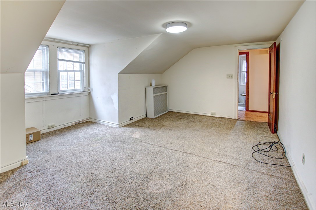 17800 Winslow Road Beachwood, OH 44122 - Photo 27 of 31 Bonus room with light colored carpet and vaulted ceiling