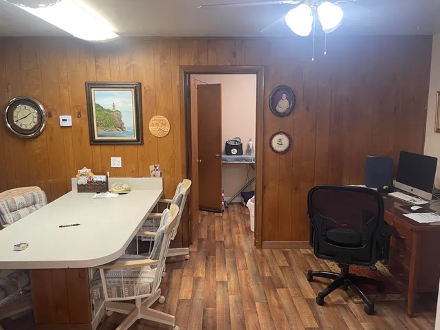 a bedroom with a bed and a bedroom