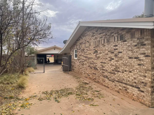 a view of a house with a patio
