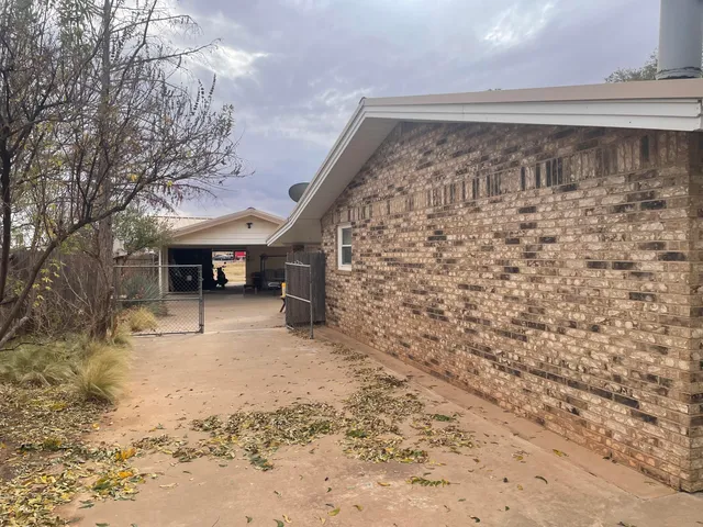 a view of a house with a patio