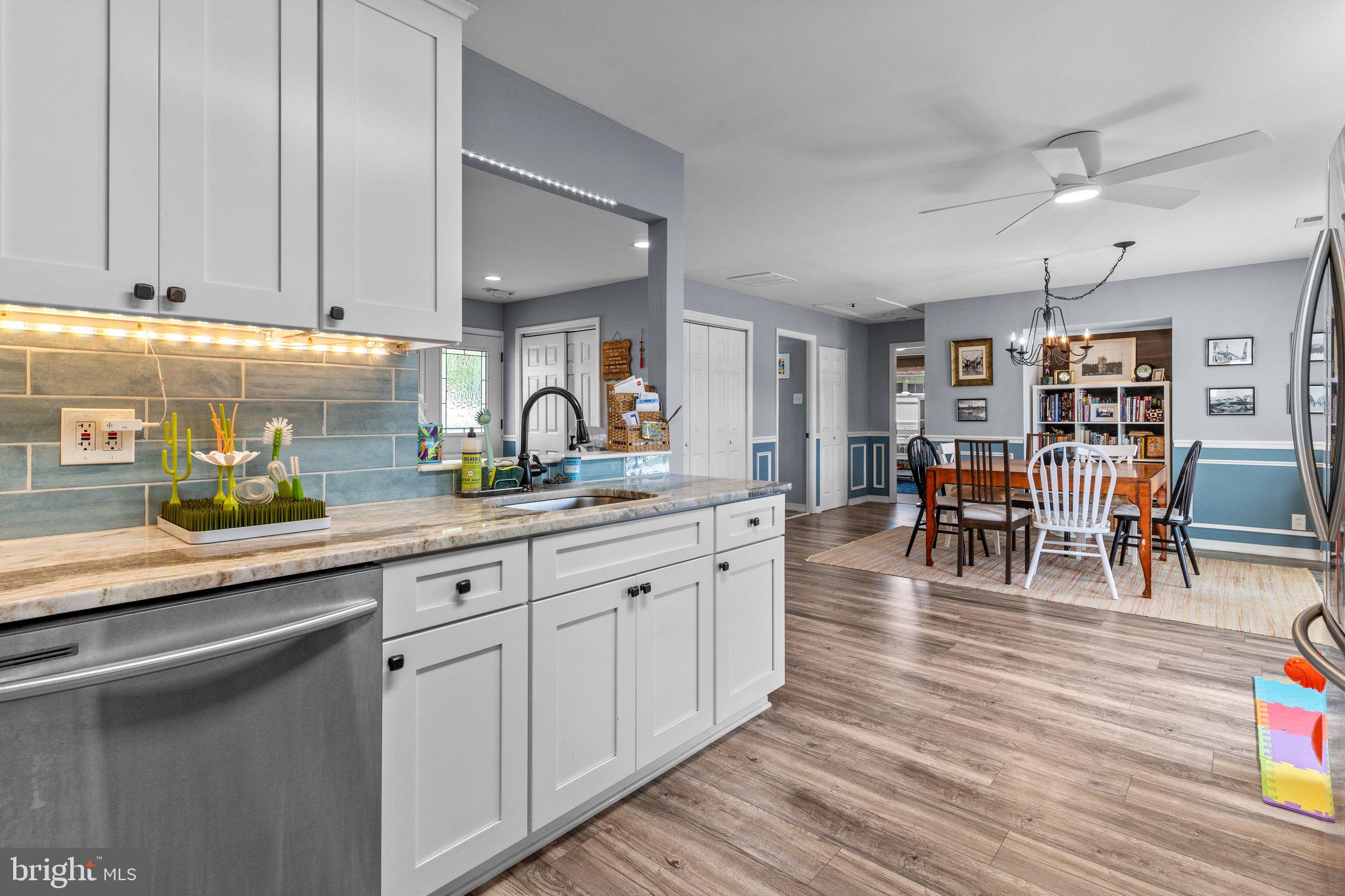 716 Auburn Road Fairless Hills, PA 19030 - Photo 10 of 28 Kitchen w/ Granite Counters & White Wood Cabinetry