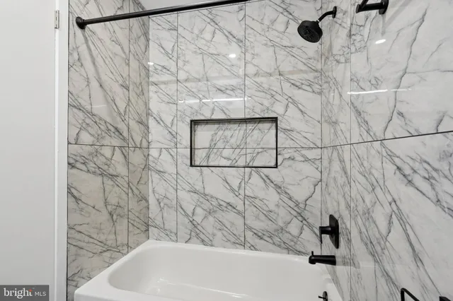 a bathroom with a bathtub