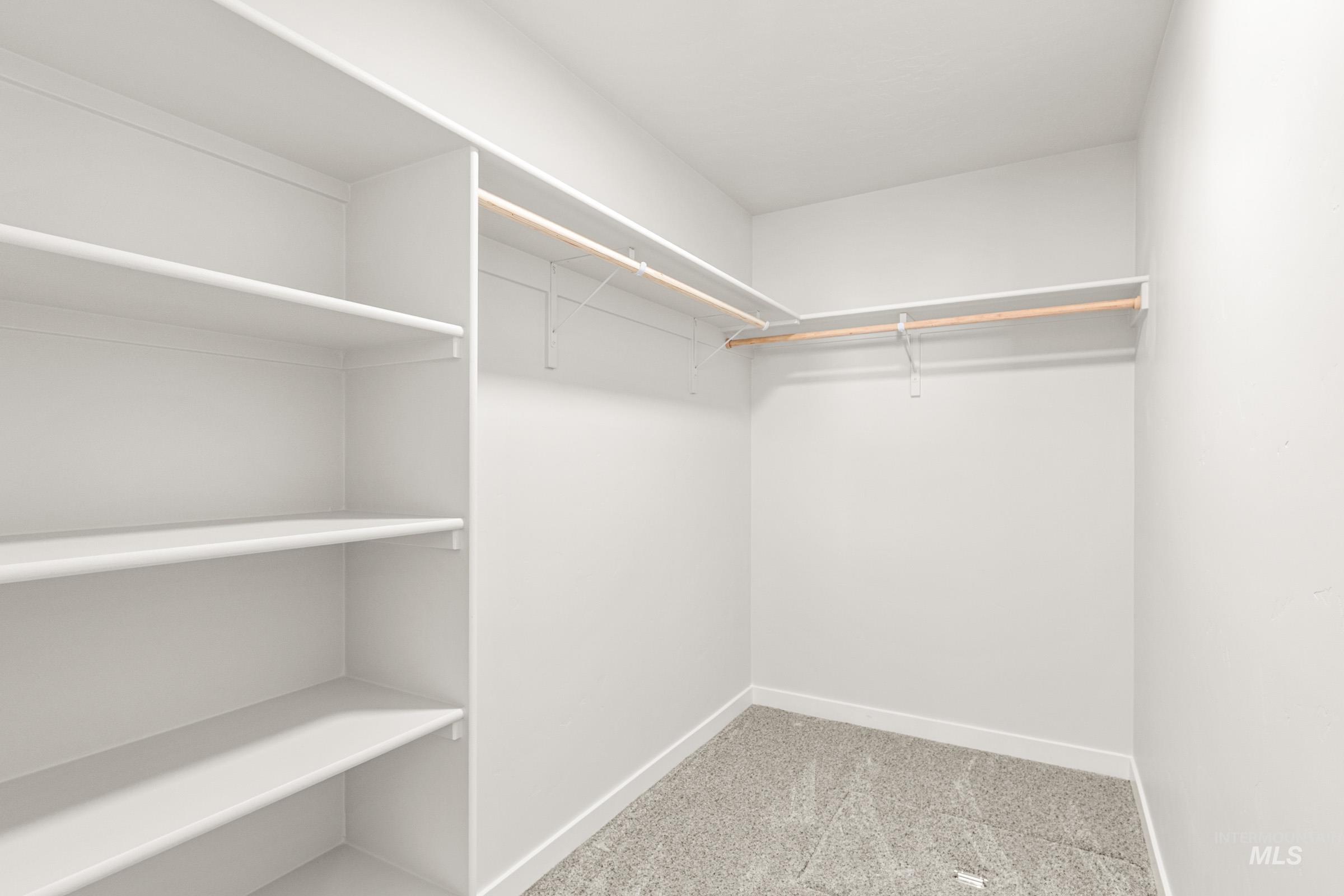 13736 Inman Court Caldwell, ID 83607 - Photo 17 of 20 Walk in closet with light carpet