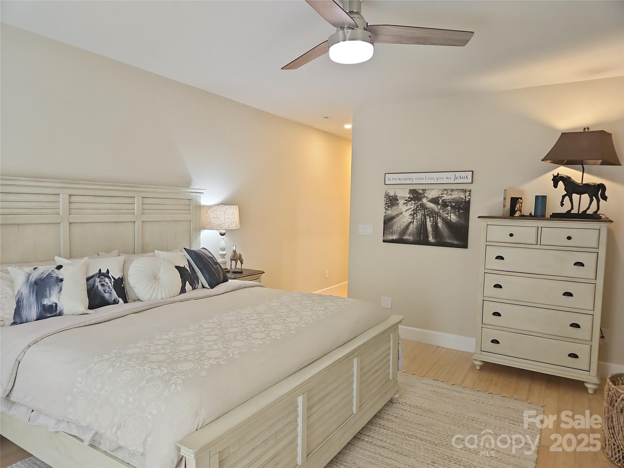 2905 Medlin Road Monroe, NC 28112 - Photo 15 of 39 a bedroom with a bed and a cabinets