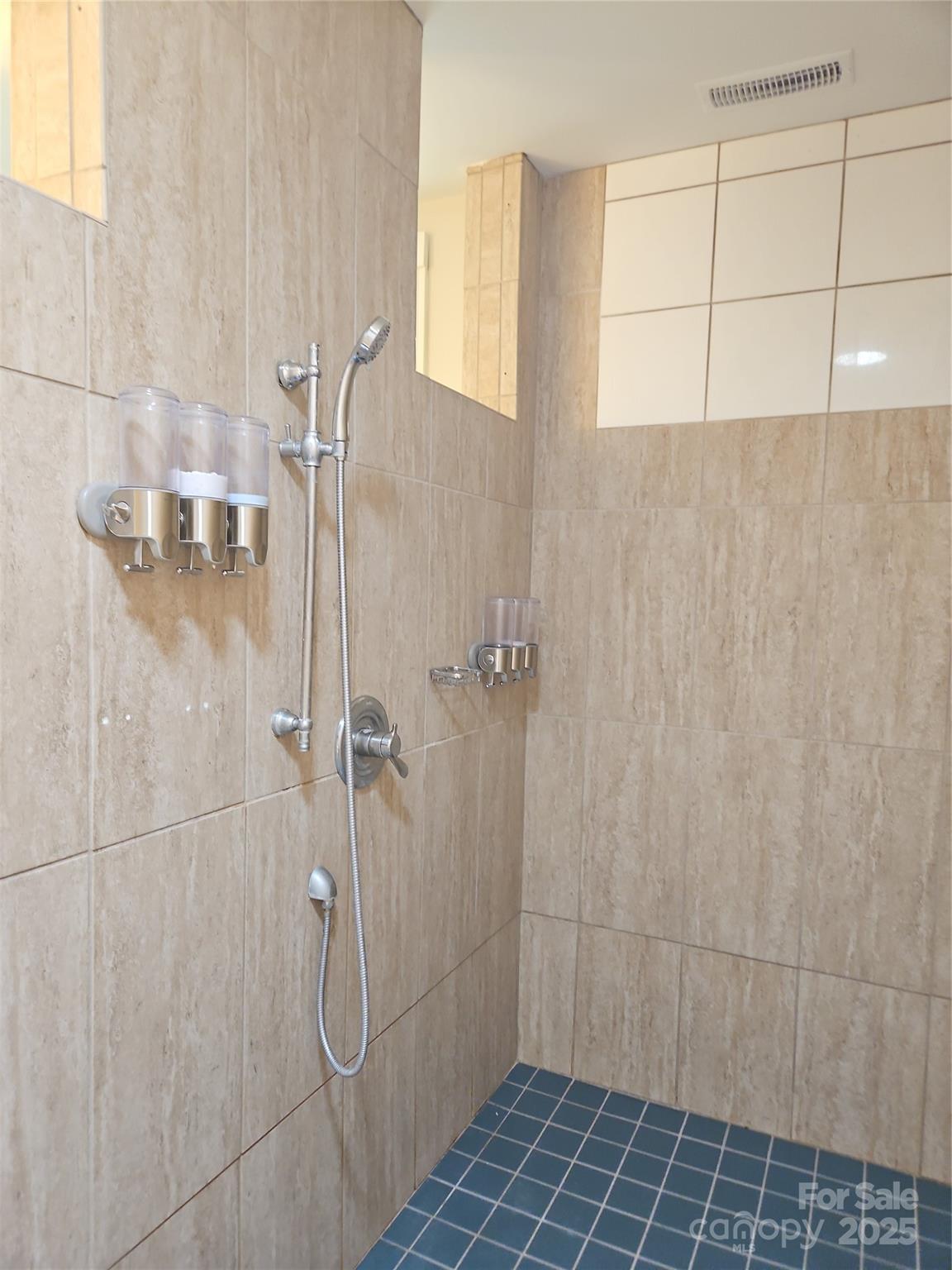 2905 Medlin Road Monroe, NC 28112 - Photo 17 of 39 a bathroom with a shower