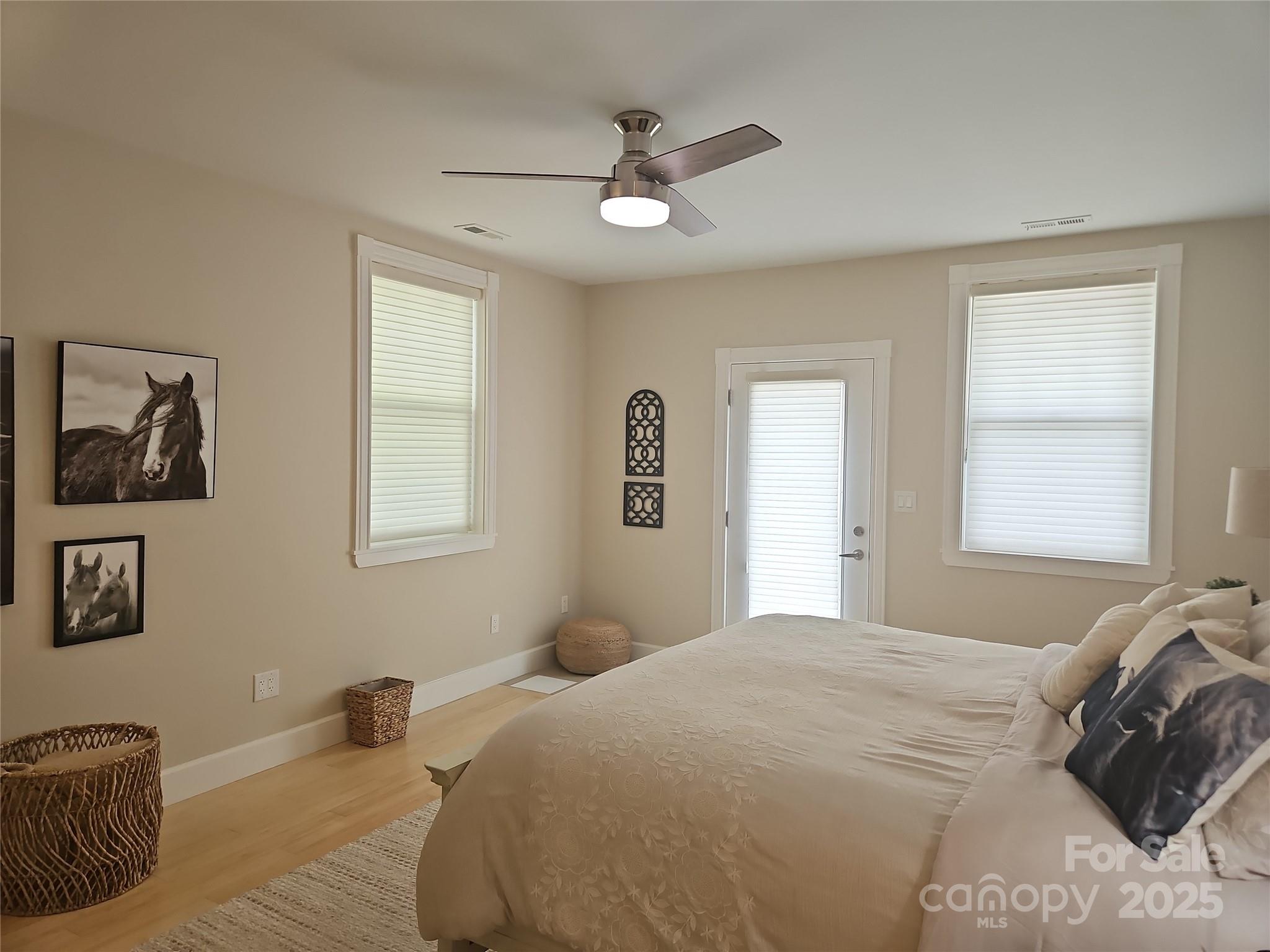 2905 Medlin Road Monroe, NC 28112 - Photo 19 of 39 a bedroom with a bed and a window