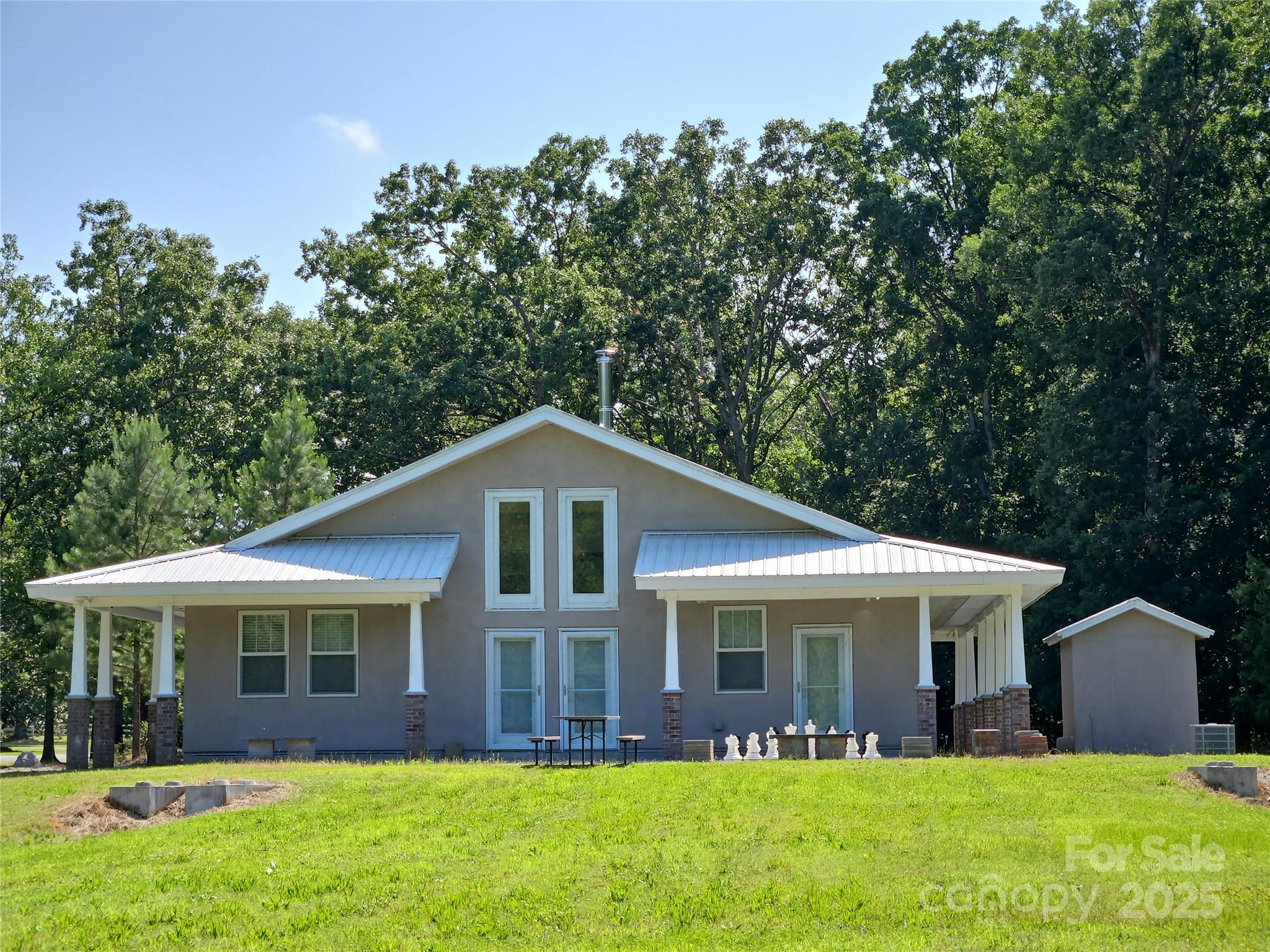 2905 Medlin Road Monroe, NC 28112 - Photo 2 of 39 a front view of house with yard and green space