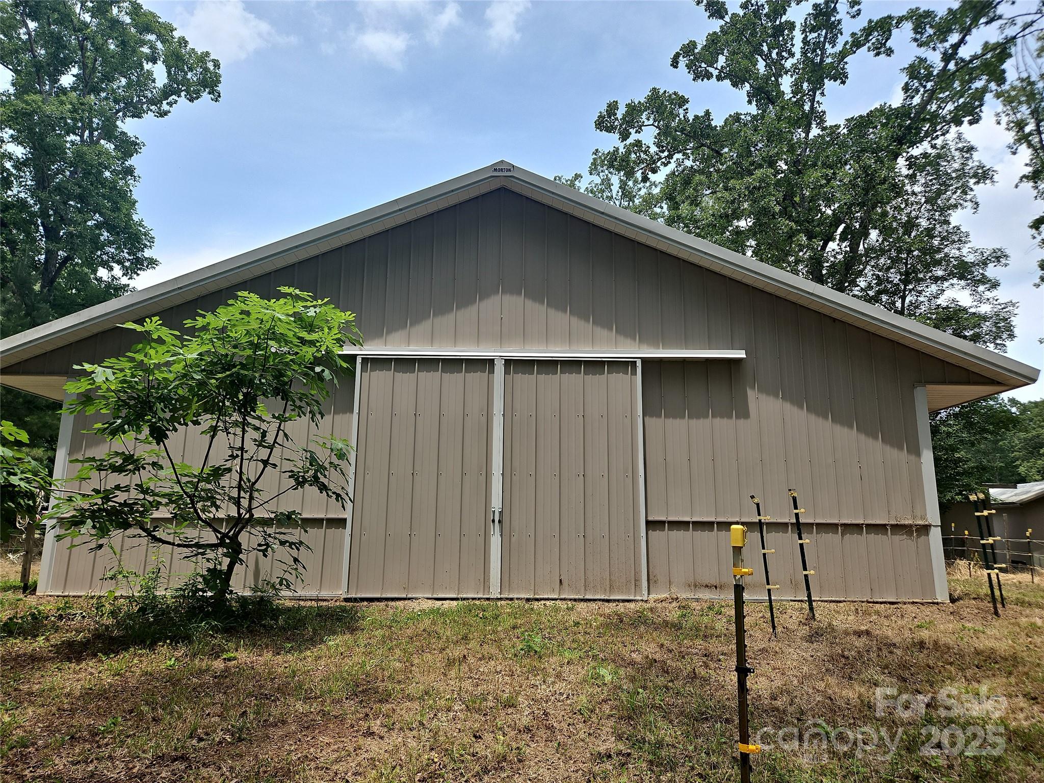 2905 Medlin Road Monroe, NC 28112 - Photo 29 of 39 a backyard of a house with lots of green space
