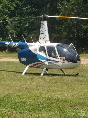 a house with swimming pool in front of it