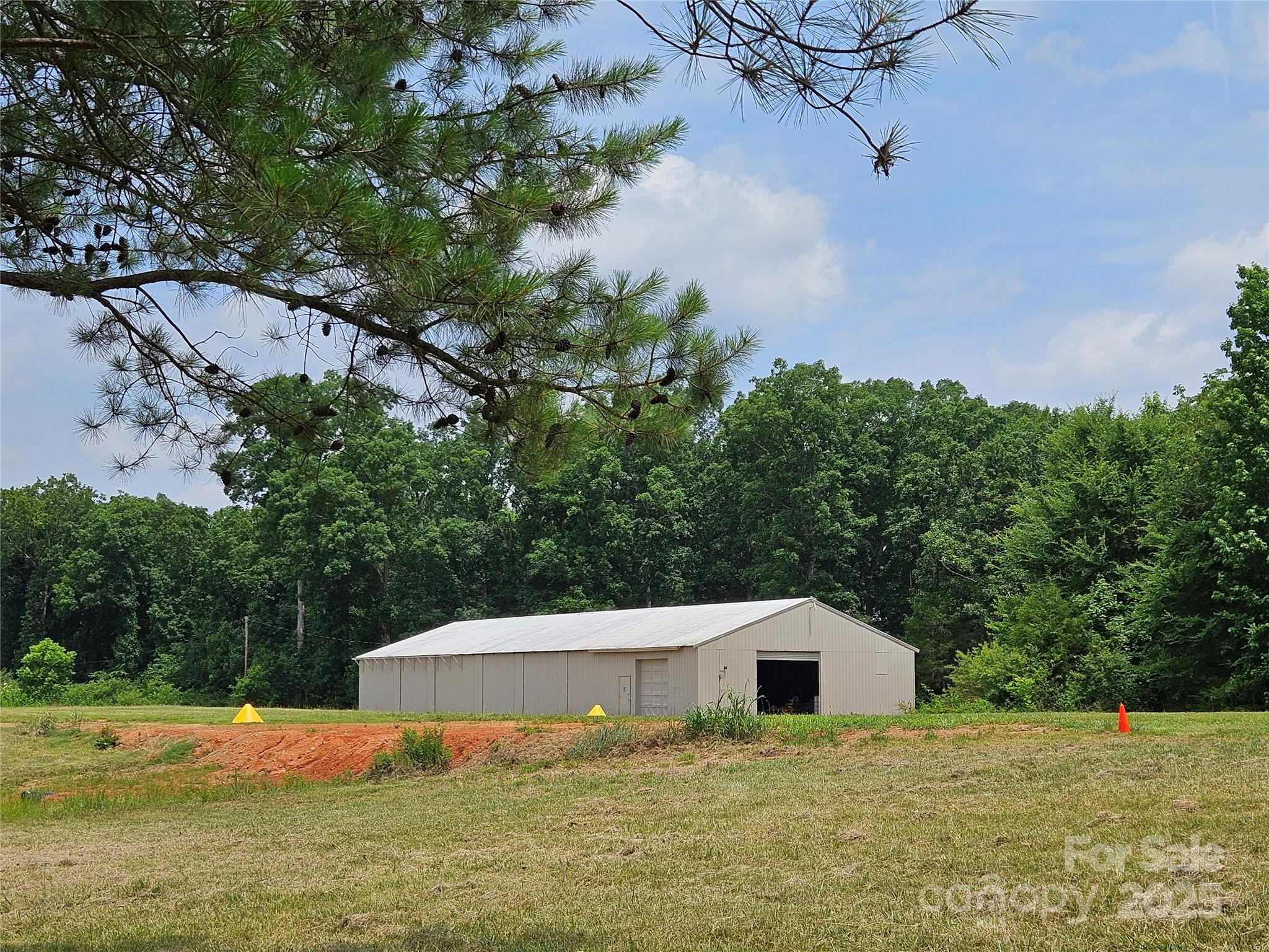 2905 Medlin Road Monroe, NC 28112 - Photo 32 of 39 a view of a house with a yard