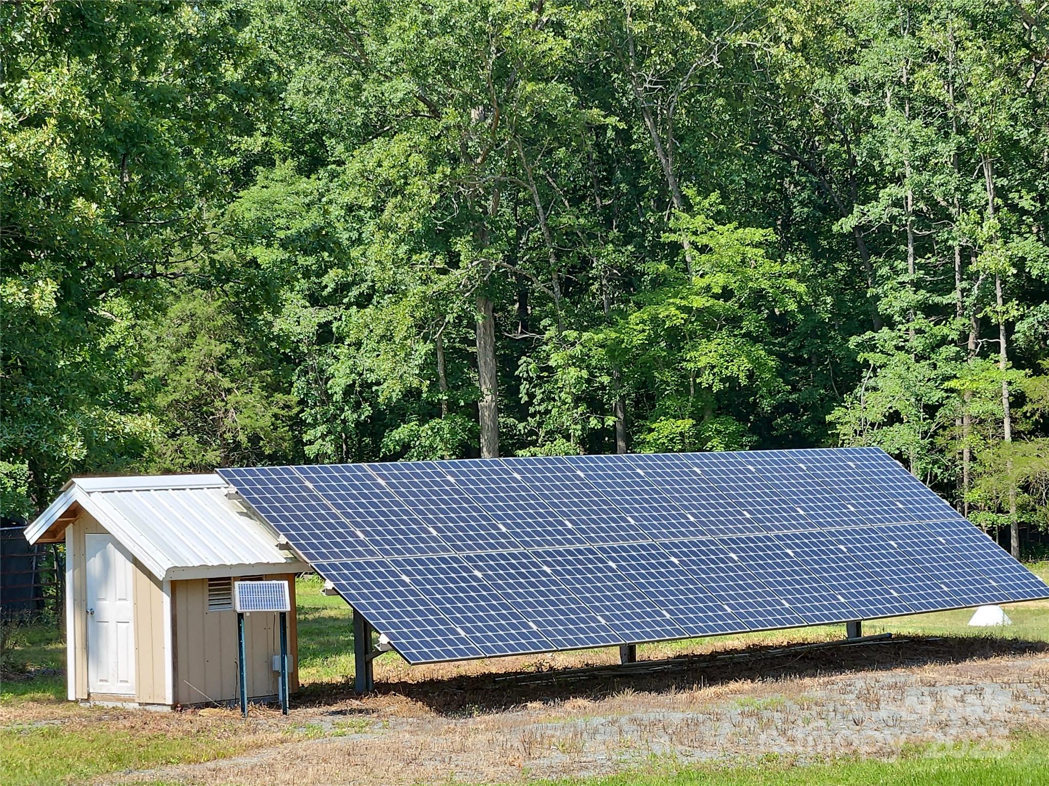 2905 Medlin Road Monroe, NC 28112 - Photo 37 of 39 a view of a roof deck with wooden floor and fence