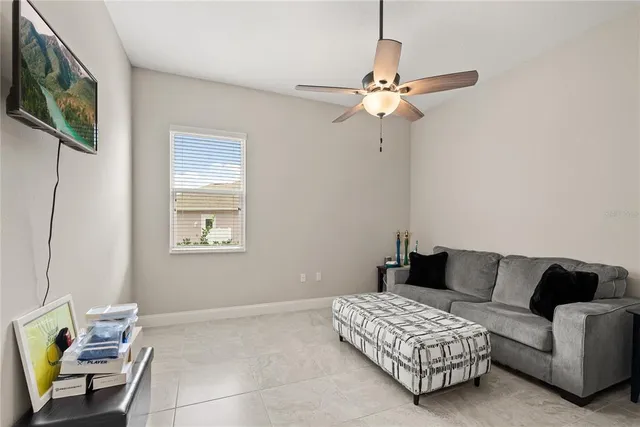 a living room with furniture and a window