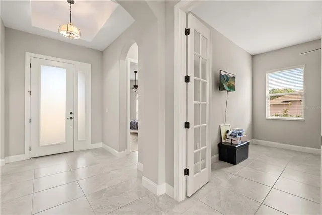 a view of a hallway with front door