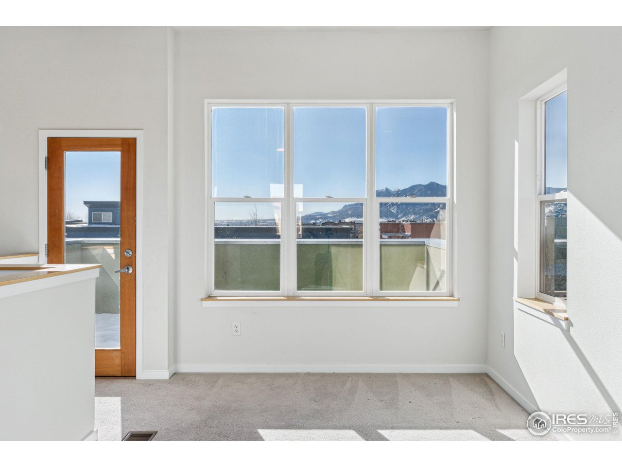 1351 Yellow Pine Avenue Boulder, CO 80304 - Photo 22 of 34 a view of an empty room with a window
