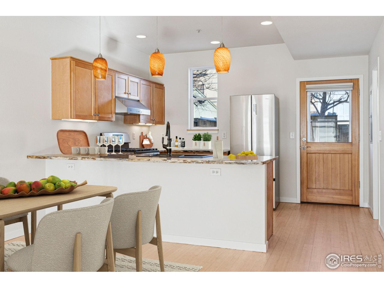 1351 Yellow Pine Avenue Boulder, CO 80304 - Photo 9 of 34 a dining room with furniture and wooden floor