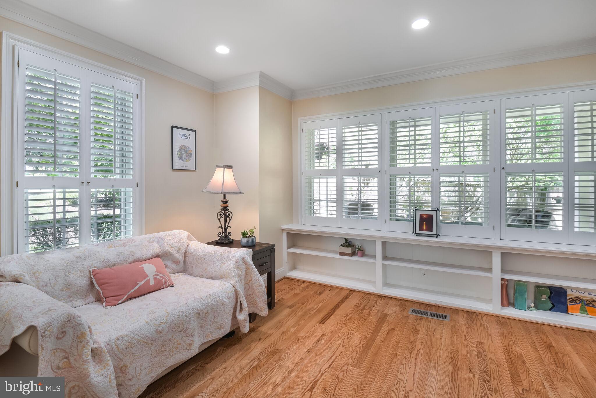 10601 Gainsborough Road Potomac, MD 20854 - Photo 14 of 55 a bedroom with furniture and a large window