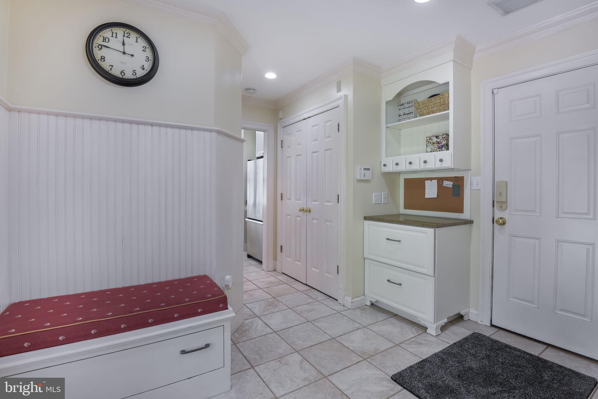 10601 Gainsborough Road Potomac, MD 20854 - Photo 29 of 55 a area with cabinets and wooden floor
