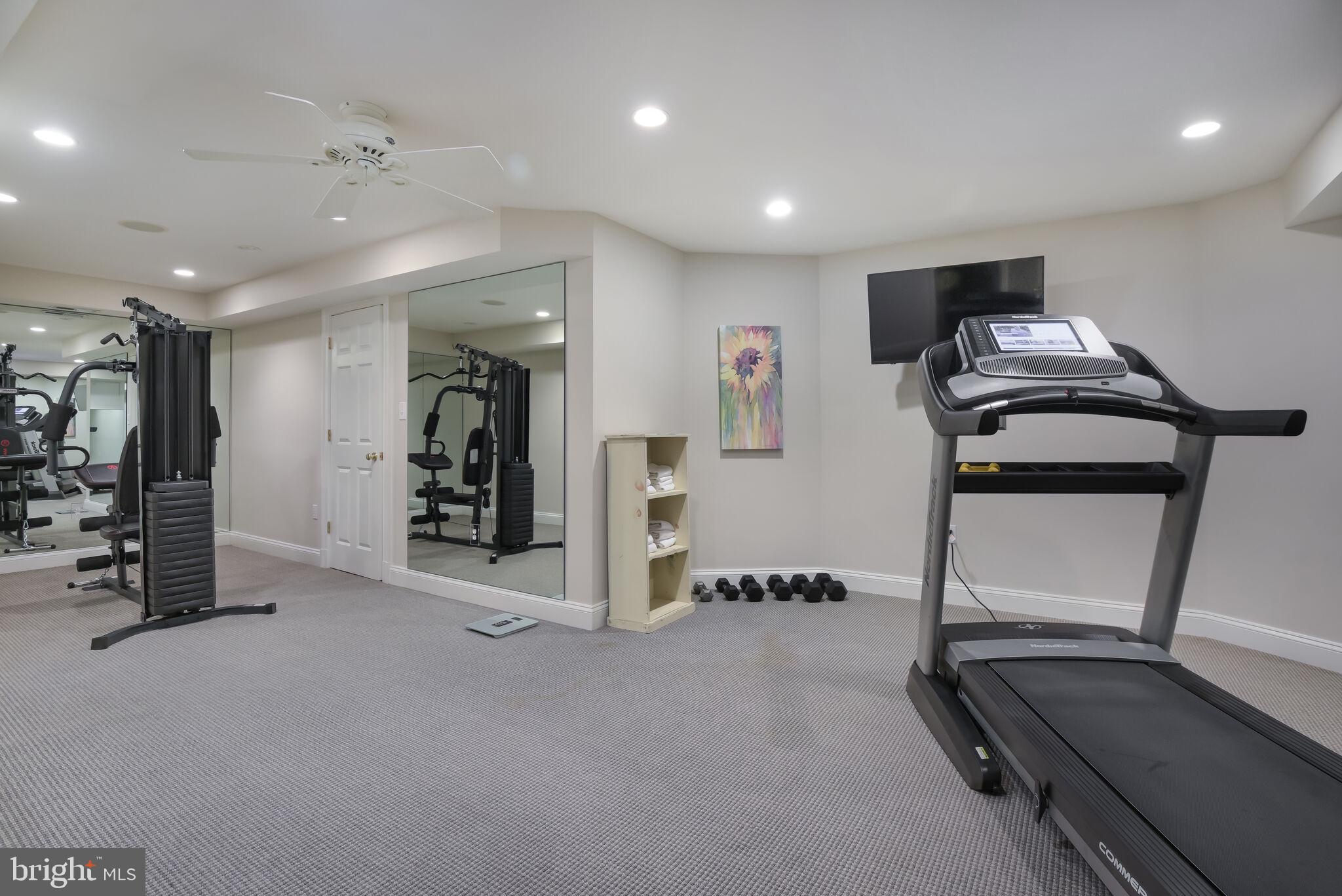 10601 Gainsborough Road Potomac, MD 20854 - Photo 45 of 55 a view of a room with gym equipment