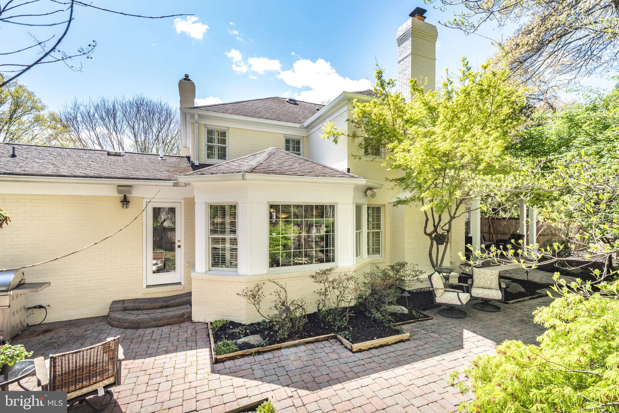 10601 Gainsborough Road Potomac, MD 20854 - Photo 49 of 55 a front view of a house with a yard
