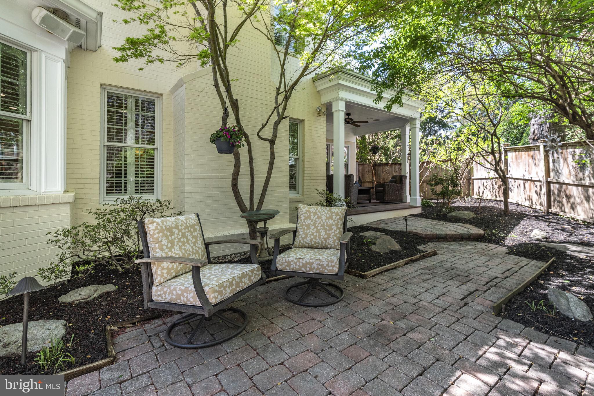 10601 Gainsborough Road Potomac, MD 20854 - Photo 50 of 55 a view of a house with backyard and sitting area