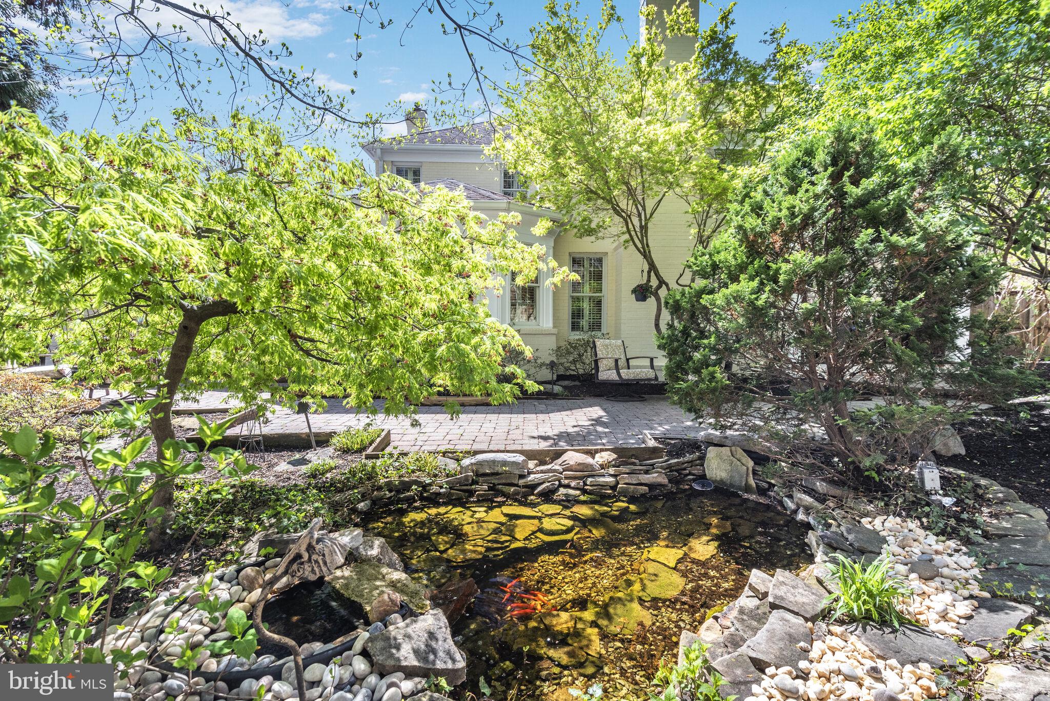 10601 Gainsborough Road Potomac, MD 20854 - Photo 51 of 55 a view of a pathway with a tree