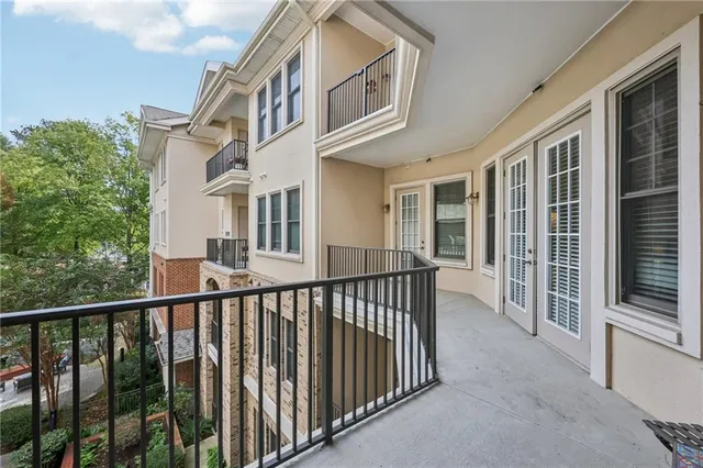 a view of a brick house from a balcony