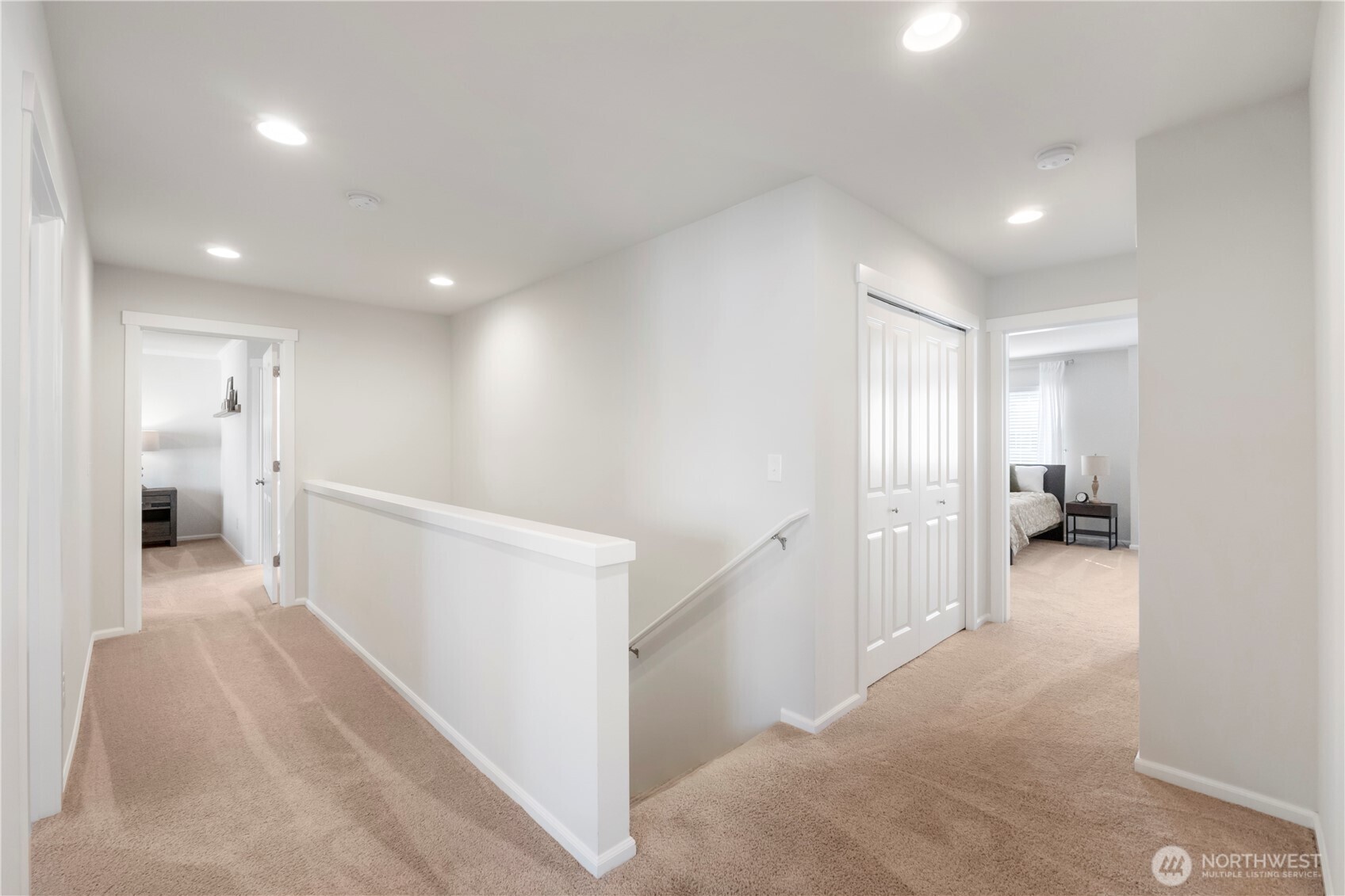 1002 O O'Farrell Lane Northwest Orting, WA 98360 - Photo 21 of 38 a view of a hallway with a livingroom and a bathroom