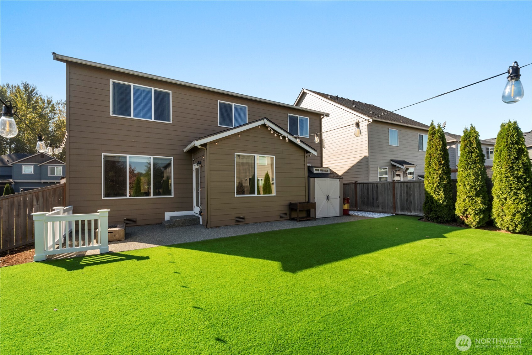 1002 O O'Farrell Lane Northwest Orting, WA 98360 - Photo 3 of 38 a view of a house with a yard and porch