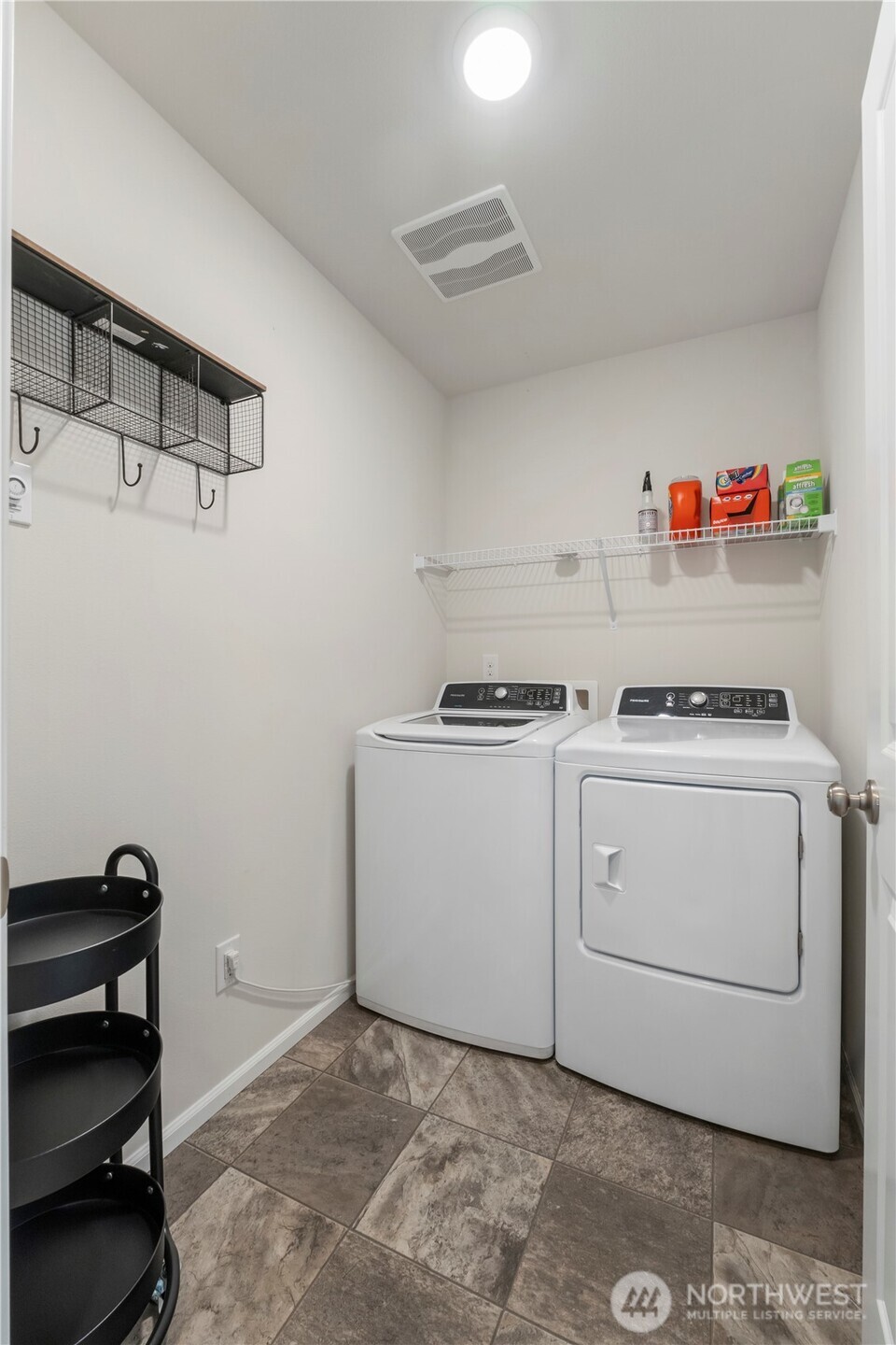 1002 O O'Farrell Lane Northwest Orting, WA 98360 - Photo 32 of 38 a utility room with dryer and washer