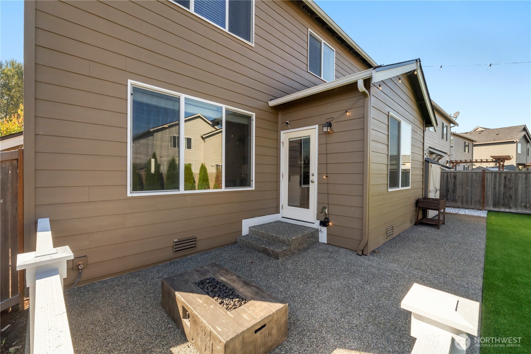 1002 O O'Farrell Lane Northwest Orting, WA 98360 - Photo 33 of 38 a view of a house with backyard
