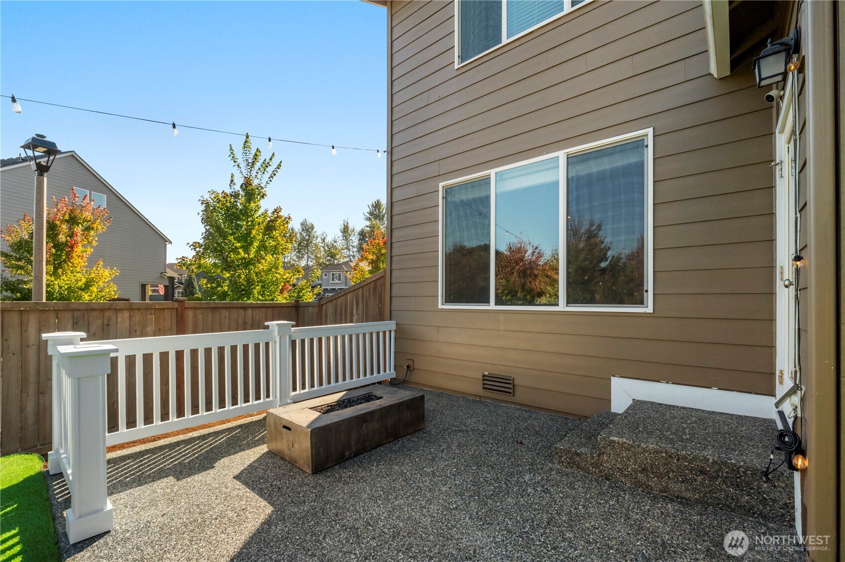 1002 O O'Farrell Lane Northwest Orting, WA 98360 - Photo 34 of 38 a view of a house with a yard