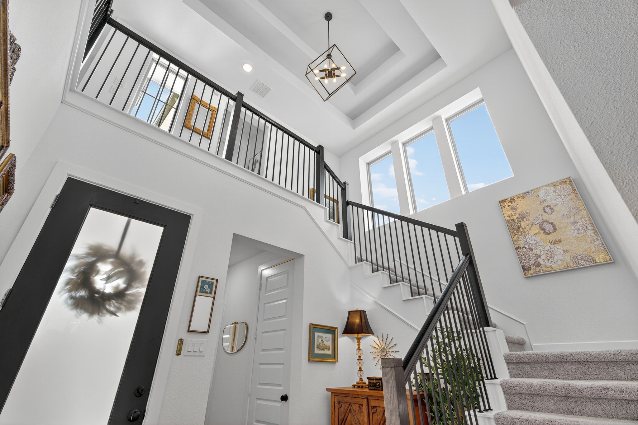 31418 Golden Cliffs Lane Fulshear, TX 77441 - Photo 11 of 48 a view of staircase with railing and white walls