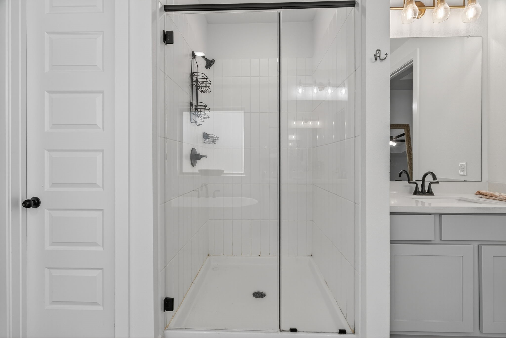 31418 Golden Cliffs Lane Fulshear, TX 77441 - Photo 25 of 48 The Primary Ensuite provides a contemporary shower enclosure with glass & modern trim! 31418 Golden Cliffs Ln., Fulshear, TX 77441