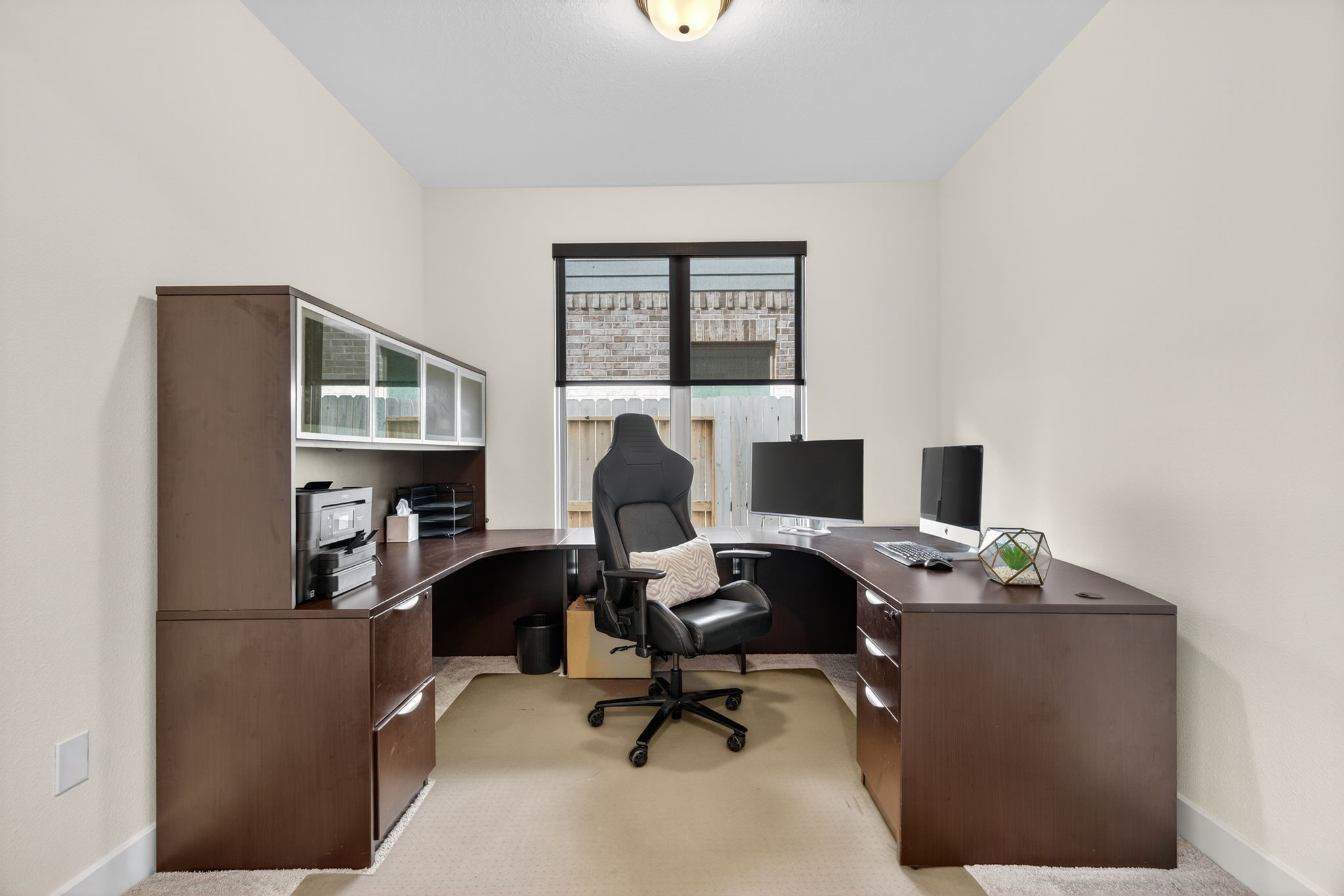 31418 Golden Cliffs Lane Fulshear, TX 77441 - Photo 29 of 48 a view of a workspace with furniture and a window