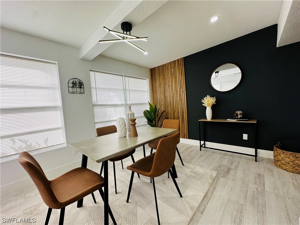 2926 Holly Road Fort Myers, FL 33901 - Photo 17 of 47 a workspace with furniture and window