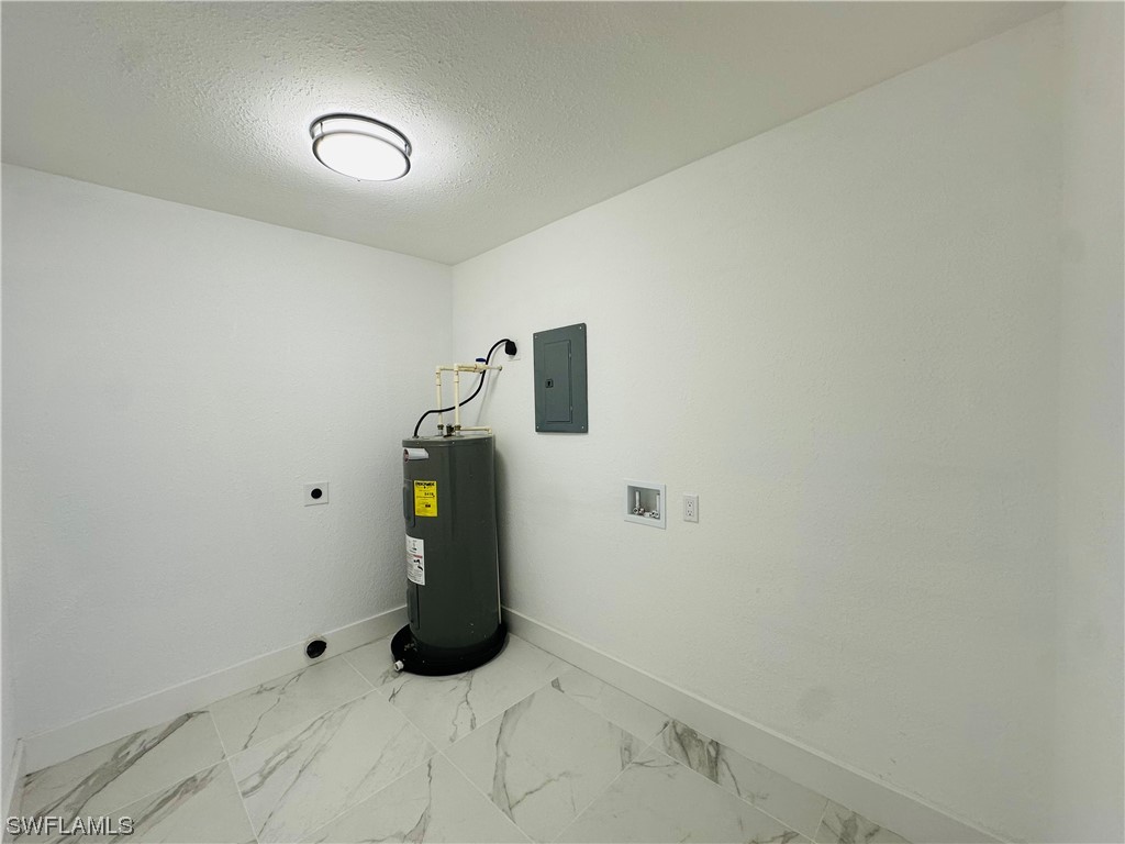 2926 Holly Road Fort Myers, FL 33901 - Photo 23 of 47 a room with closet and white wall