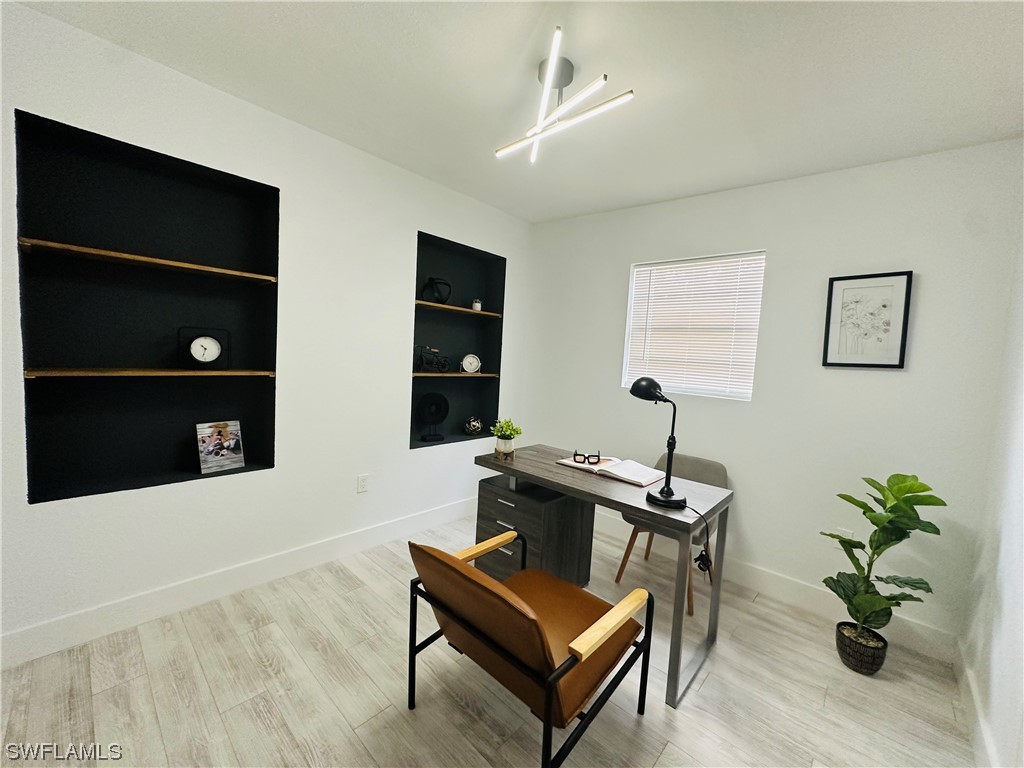 2926 Holly Road Fort Myers, FL 33901 - Photo 24 of 47 a view of a workspace with furniture