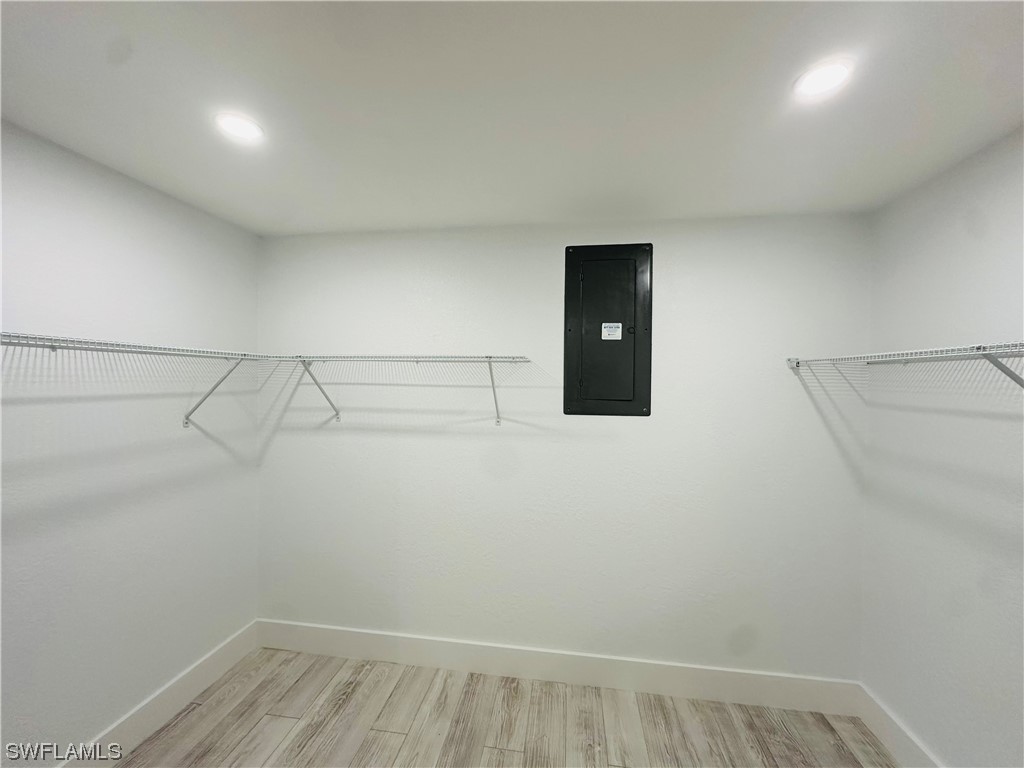 2926 Holly Road Fort Myers, FL 33901 - Photo 27 of 47 a view of a room with racks on the wall