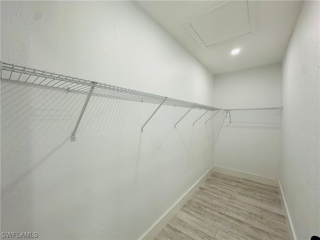 2926 Holly Road Fort Myers, FL 33901 - Photo 35 of 47 a view of a room with racks on the wall