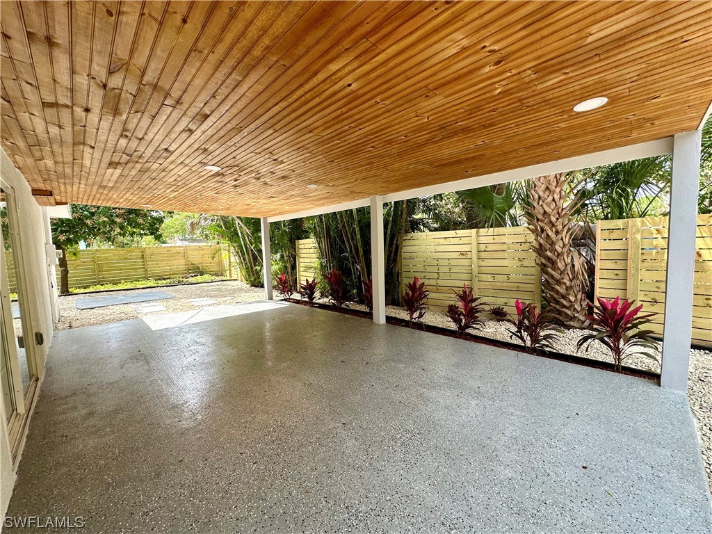 2926 Holly Road Fort Myers, FL 33901 - Photo 43 of 47 a view of a room with wooden walls