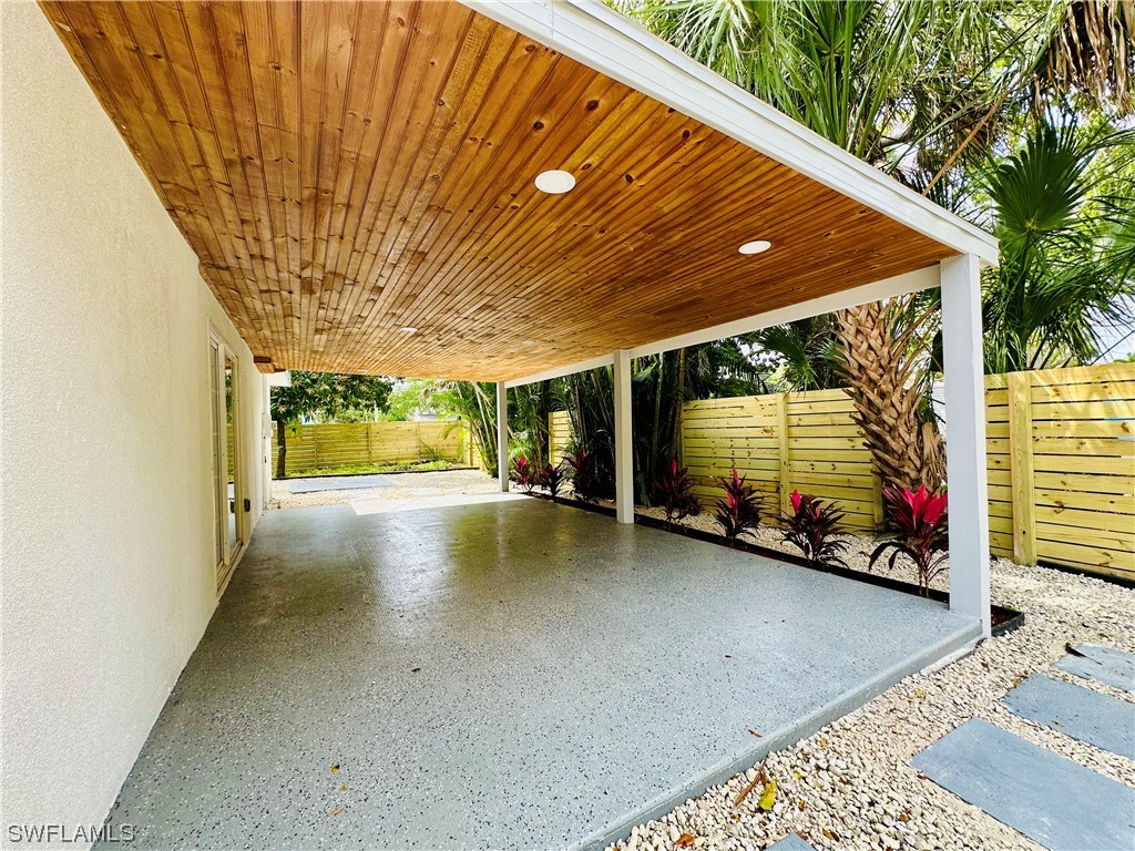 2926 Holly Road Fort Myers, FL 33901 - Photo 44 of 47 a view of swimming pool with outdoor seating