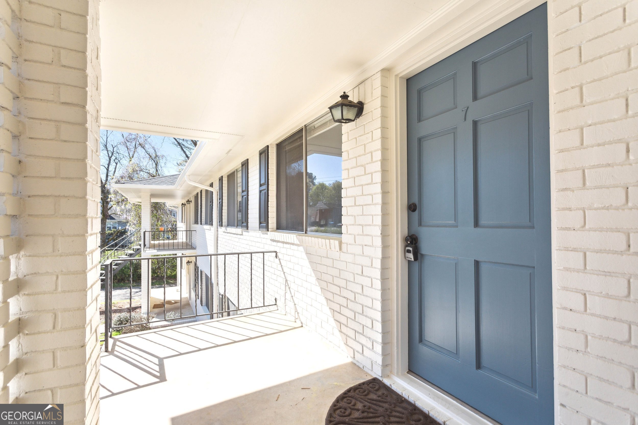 144 Jackson Street Newnan, GA 30263 - Photo 12 of 19 a view of a house with a door and wooden floor