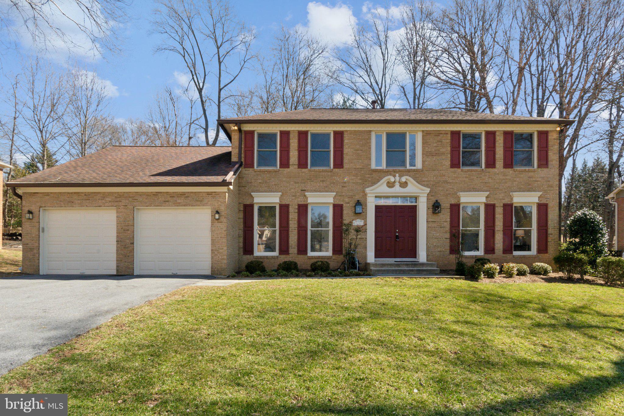15301 Watergate Road Silver Spring, MD 20905 - Photo 1 of 51 a front view of building with yard and trees in the background