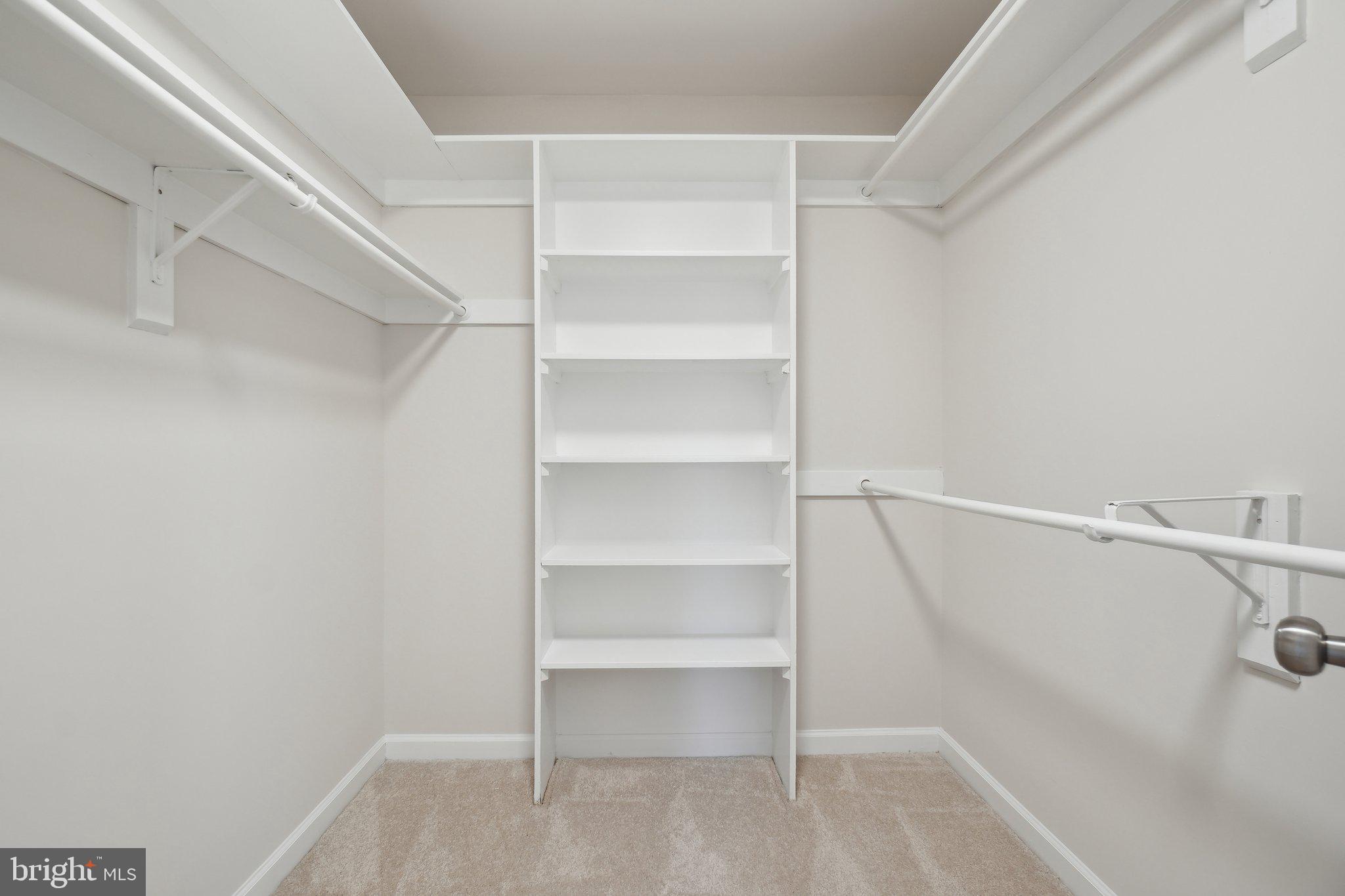 15301 Watergate Road Silver Spring, MD 20905 - Photo 21 of 51 a view of an empty walk in closet